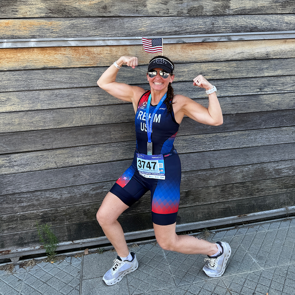Nancy Rehm posing after competing at the World Triathlon Multisport World Championships in Spain